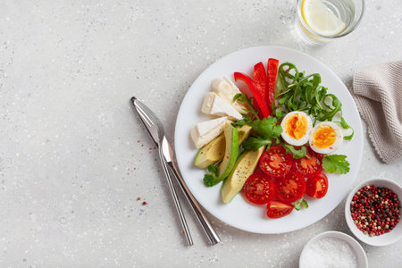 keto diet breakfast egg avocado brie cheese tomato bell pepperの写真素材