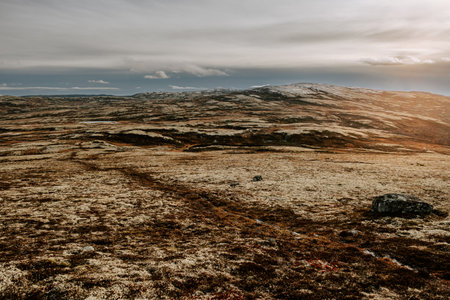 dark moody northern landscape, path from a mountain Rogne in Norwayの写真素材
