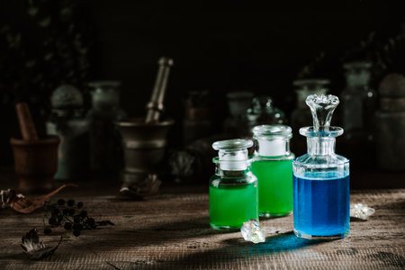 Witchcraft still life concept with potion, herbs ingredients and magical equipmentの写真素材
