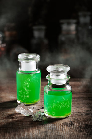 Witchcraft still life concept with potion, herbs ingredients and magical equipmentの写真素材