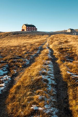 beautiful winter landscape with snow view to Killingdal Gruve in Norway in sunnlightの写真素材