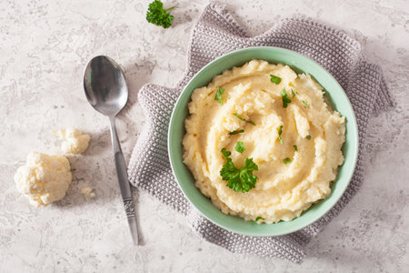 mashed cauliflower with butter. ketogenic paleo diet side dishの写真素材