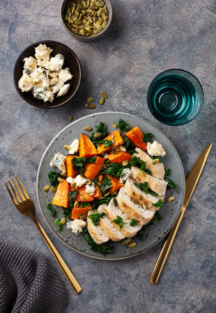 chicken breast with sweet potato, blue cheese and kale. healthy lunchの写真素材