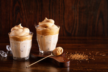 dalgona coffee in glass. trendy Instant coffee whipped with sugar and hot waterの写真素材