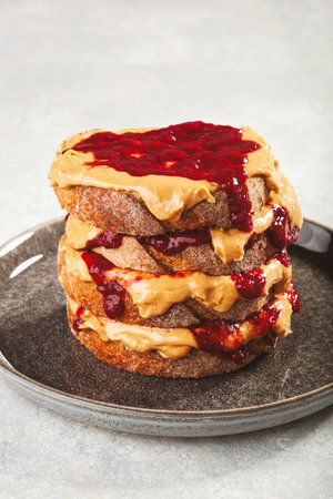 peanut butter and jam sandwich, american traditional bread toastの写真素材