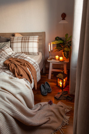 cozy scandinavian bedroom interior in natural tones, real life mess disorderの写真素材