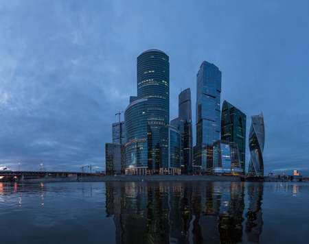 Moscow city and reflections in Moscow river, Russiaの写真素材