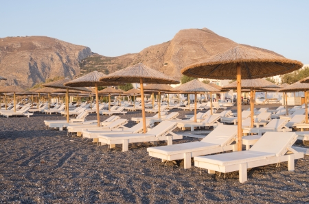 Beach in the morning in Kamari on Santorini in Greece の写真素材
