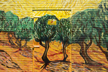 NETHERLANDS - WASSENAAR - CIRCA MAY 2014  Painters of the group  Rembrandt Paintings  have a power house painted with the painting  Olive trees with yellow sky and sun from Vincent van Gogh のeditorial素材