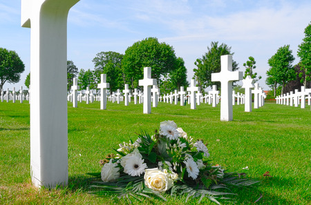 NETHERLANDS - MARGRATEN - CIRCA JUNE 2014  Flowers on a grave of a fallen U S  soldier at the Netherlands American Cemetery and Memorial のeditorial素材