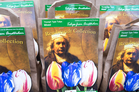 NETHERLANDS - AMSTERDAM - CIRCA FEBRUARY 2014: Bulb bags with the portrait of the painter Rembrandt van Rijn in a market stall at the flower market in Amsterdam.のeditorial素材