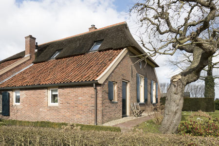 NETHERLANDS - BRONCKHORST - CIRCA MARCH 2015: Farmhouse in the smallest city in the Netherlands.のeditorial素材