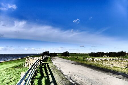 Impressive art of a dike in Scarl in Friesland, Netherlands.の写真素材