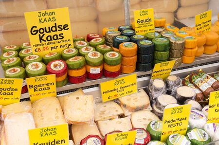 NETHERLANDS - AMSTERDAM - CIRCA MARCH 2014: Market stall with cheese on the Albert Cuyp market in Amsterdam, Netherlands.のeditorial素材