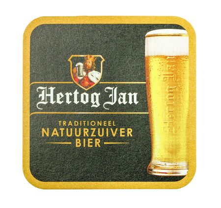 NETHERLANDS - LUNTEREN - JULY 17, 2017: Hertog Jan beer mat. Isolated on white background.のeditorial素材