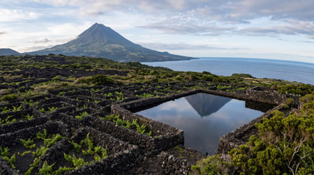 Mount Pico, Pico Island Azores in Portugal, showing volcanic cone and authentic regional scenery for commercial travel stock use.