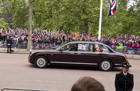 London, England - April 29, 2011 - Queen Elizabeth and Duke of Edinburgh Bentley on the Mall during the Royal Weddingのeditorial素材