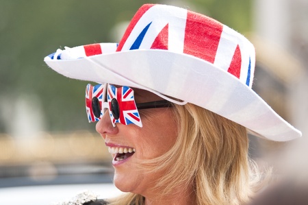 London, England - April 28, 2011 - One day before the royal wedding, a woman specially dressed for this eventのeditorial素材