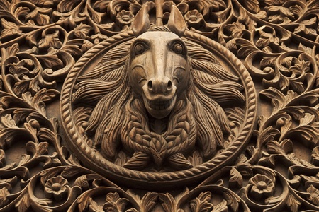 Horse head wood sculptureの写真素材