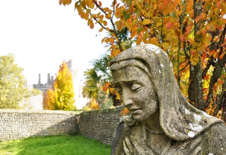 Virgin Mary statue in Arundel graveyard, England, UKの写真素材
