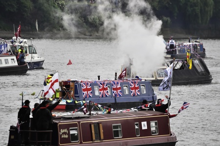 LONDON, UK, Sunday June 3, 2012. Hundred of boats muster on the river Thames in Putney (west London) for the Thames Diamond Jubilee Pageant.のeditorial素材