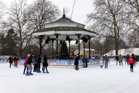 LONDON, UK - DECEMBER 13: People ice skating at Winter Wonderland in Hyde Park, December 13, 2012 in London. Winter Wonderland will be opened until January 6, 2013.のeditorial素材