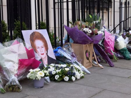 LONDON - UK, April 08: Flowers and messages in front of Margaret Thatcherのeditorial素材