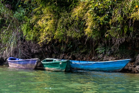 Colorful barques on Phewa Lake in Pokara, Nepalの写真素材