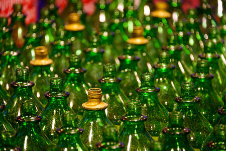 Empty green glass bottles, shallow depth of fieldの写真素材