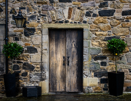 Wooden entrance door of an old houseのeditorial素材