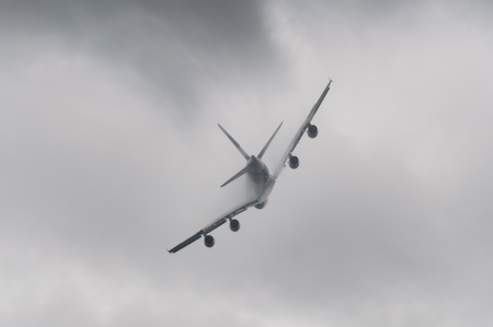 Airplane flying in bad weatherの写真素材