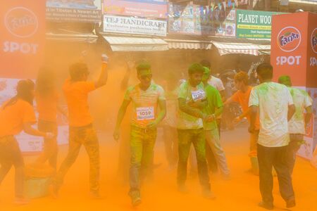 KATHMANDU, NEPAL - MARCH 15, 2014  The Colour Run is part of the Holi Festival celebrations 