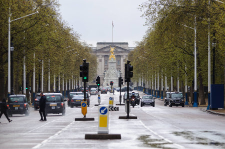 LONDON, UK - CIRCA APRIL 2012  The Mall and Buckingham Palace by a rainy day のeditorial素材