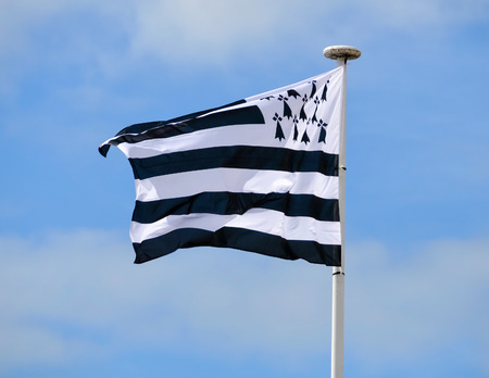 Brittany flag on blue sky backgroundの写真素材