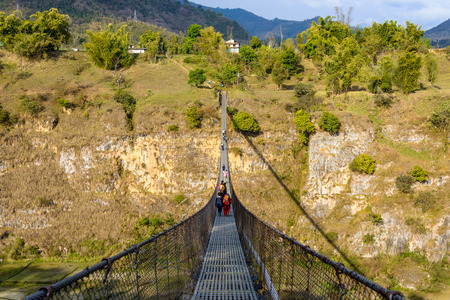 Suspension bridge over the Bhalam river in Pokhara, Nepalの写真素材