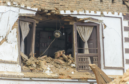 KATHMANDU, NEPAL - APRIL 26, 2015: A destroyed house at Durbar Square, a UNESCO World Heritage Site, which was severly damaged after the major earthquake on 25 April 2015.のeditorial素材