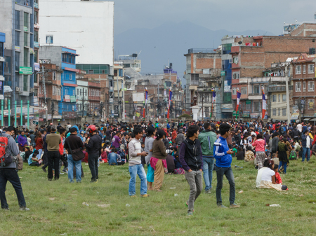 KATHMANDU, NEPAL - APRIL 25, 2015: People gather on an open ground at Chuchepati just after the 7.8 earthquake hit Kathmanduのeditorial素材