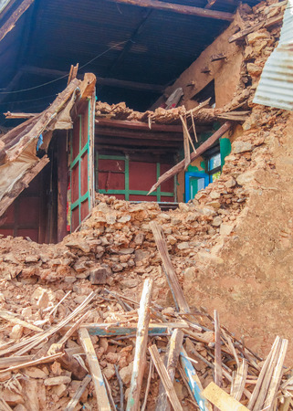 KOT DANDA, LALITPUR, NEPAL - MAY 2, 2015: Damaged house after the 7.8 earthquake that hit Nepal on April 25, 2015.のeditorial素材