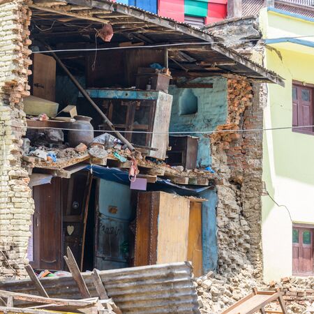 KATHMANDU, NEPAL - MAY 13, 2015: A damaged house after a 7.3 earthquake hit Nepal on May 12, 2015.のeditorial素材