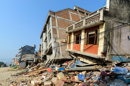 KATHMANDU, NEPAL - MAY 22, 2015: Two partially collapsed buildings after two major earthquakes hit Nepal on April 25 and May 12, 2015.のeditorial素材