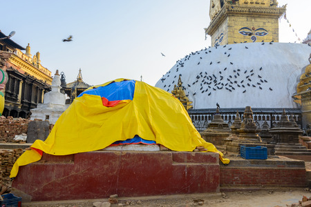 KATHMANDU, NEPAL - MAY 22, 2015: Swayambhunath, a UNESCO World Heritage Site, was severely damaged after two major earthquakes hit Nepal on April 25 and May 12, 2015.のeditorial素材