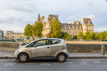PARIS, FRANCE - CIRCA AUGUST 2015: An Autolib' is parked at an Autolib' station and charging point. Autolib' is an electric car sharing service.のeditorial素材