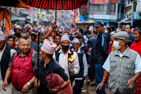 PATAN, NEPAL - MAY 19, 2016: God of rain Rato Machhindranath chariot festival. Rato Machhindranath is worshiped as the god of rain. The chariot is pulled through the street of Patan for about a month.のeditorial素材
