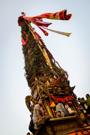 PATAN, NEPAL - MAY 19, 2016: God of rain Rato Machhindranath chariot festival. Rato Machhindranath is worshiped as the god of rain. The chariot is pulled through the street of Patan for about a month.のeditorial素材