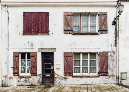 Dilapidated house facade in Brittany, Franceの写真素材