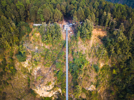 Drone view of the suspension bridge over the Kali Gandaki river between Kushma and Balewa in Nepalの写真素材