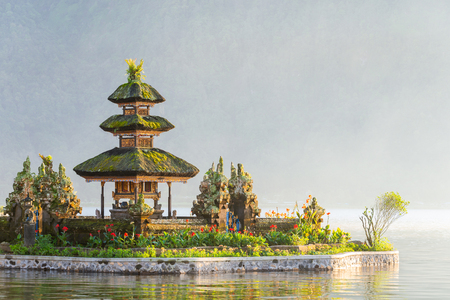 Ulun Danu Beratan temple smallest shrine at sunrise in Bali, Indonesiaの写真素材