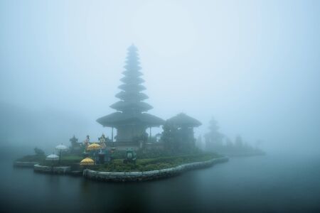 Foggy weather at Pura Ulun Danu Beratan temple in Bali, Indonesia.の写真素材