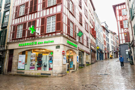 BAYONNE, FRANCE - MARCH 16, 2019: An open pharmacy during France lockdown following the Coronavirus outbreak.のeditorial素材