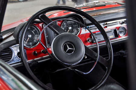 LONDON, UK - CIRCA SEPTEMBER 2011: Classic red Mercedes dashboard and steering wheel at Chelsea...